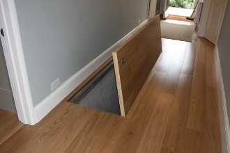 Recessed door with hardwood laminate - open